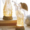 Raz 12" Lighted Angel With Trumpet Gold Glittered Swirling Water Globe 4219053 -The Jolly Christmas Shop 4219053 edit 53917.1657668556